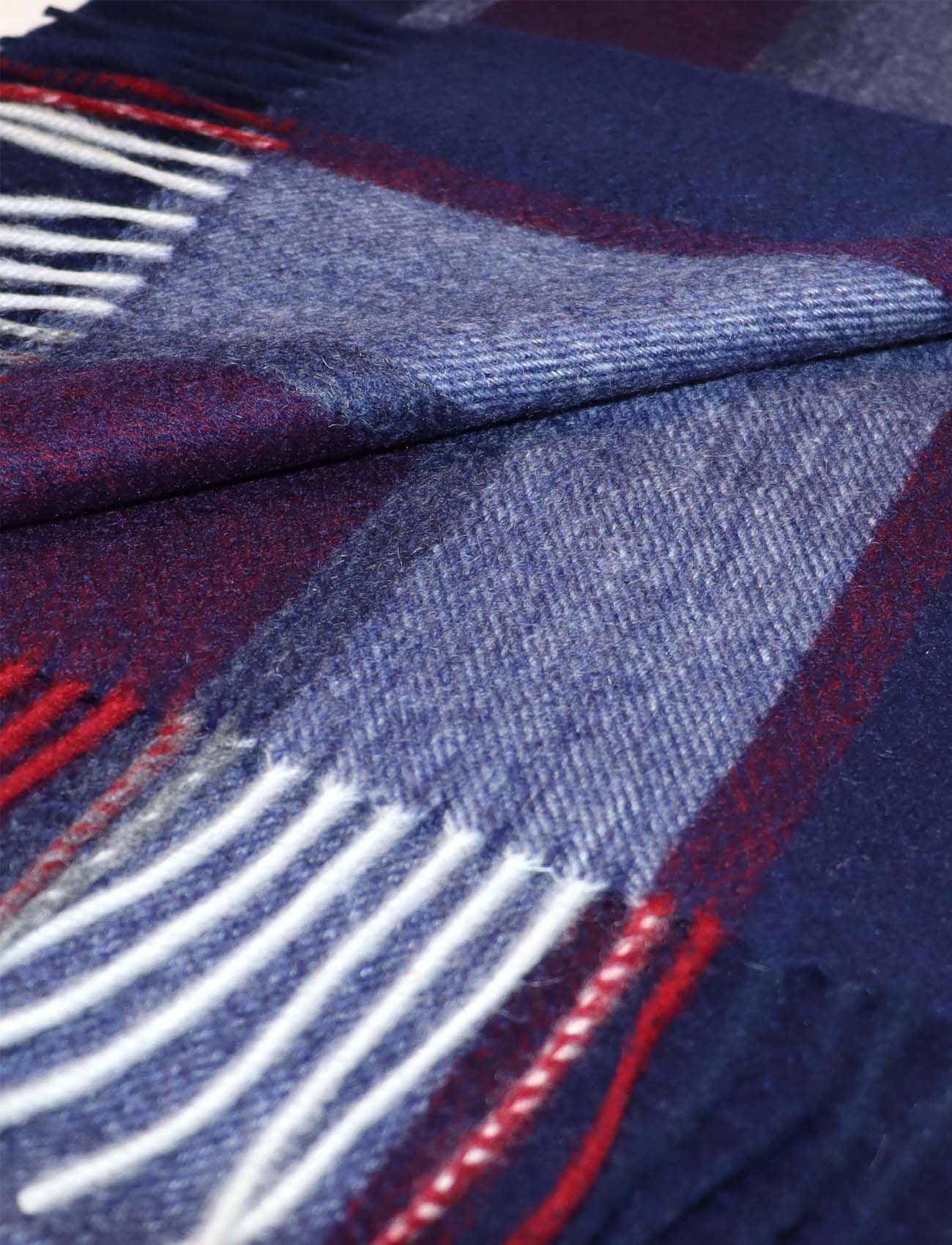 Striped Cashmere Scarf in navy blue for women and men details